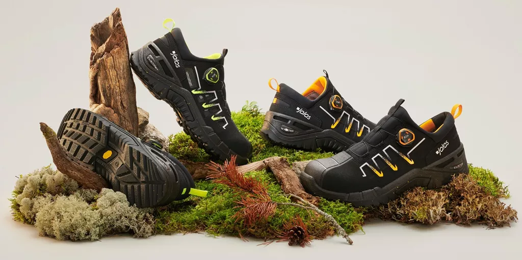 JALAS® Exalter safety shoes in sustainable materials with BOA® fit system displayed on natural moss and wood